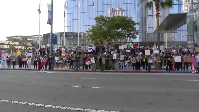 Demonstrators rally outside the Oxnard City Hall on Tuesday, June 10, 2025 in opposition of immigration raids at local agricultural fields.